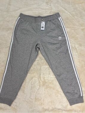 Adidas Men’s Gray Jogger Sweatpants with Side Stripes